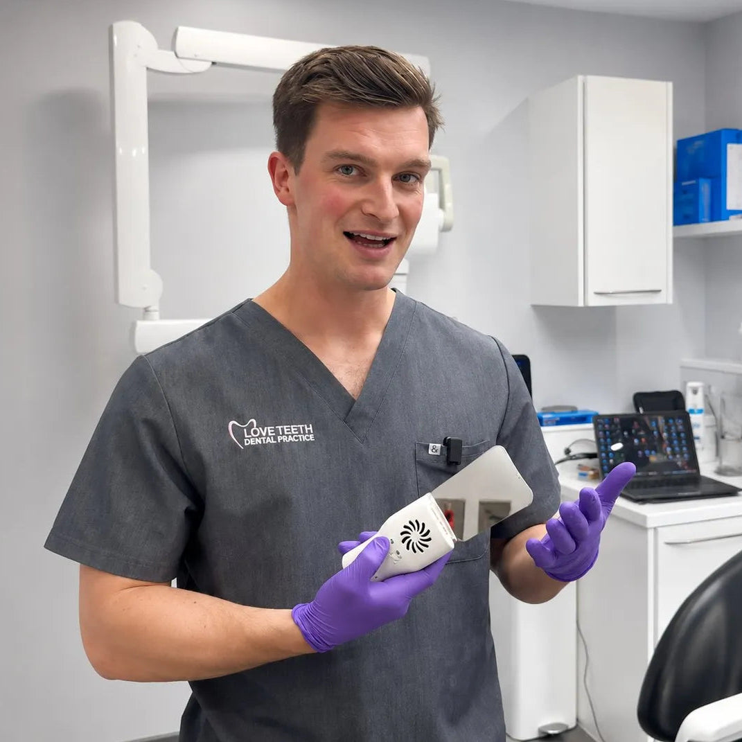 Dentist presenting the anti-fog mirror for dental case documentation.
