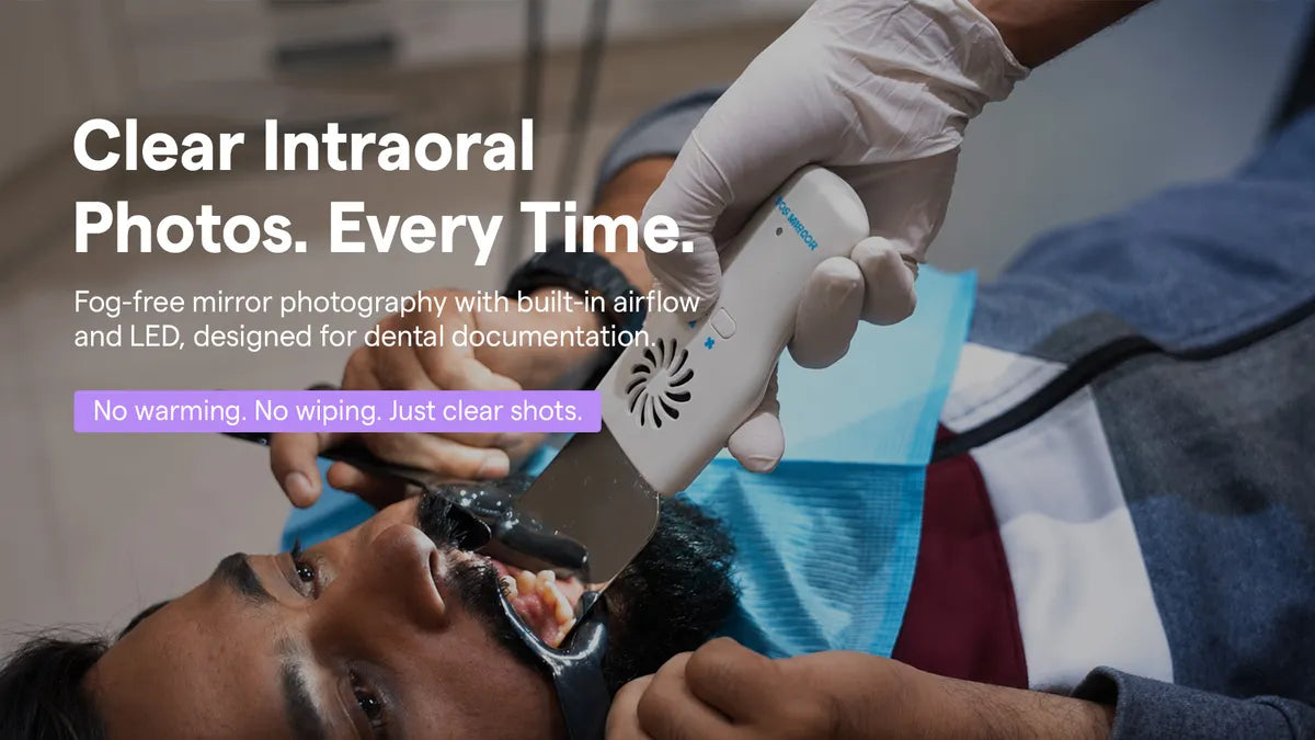 Load video: Dentist taking an intraoral photo of a patient using the Anti-Fog Mirror