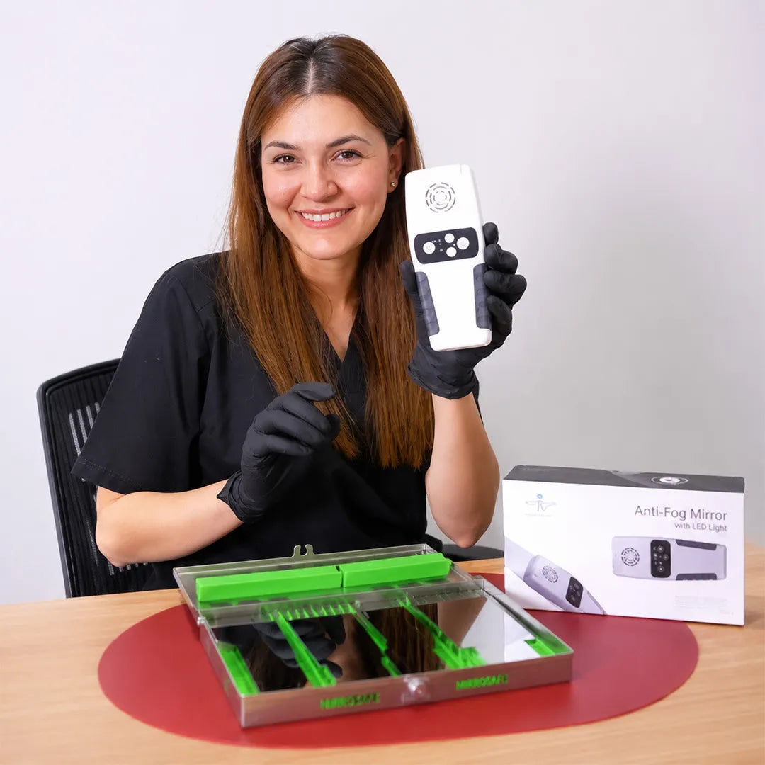 Dentist showing the Anti-Fog Mirror Pro full kit and accessories.