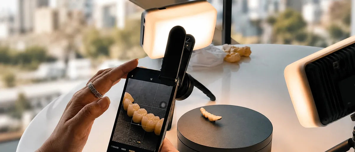 Photographing dental restorations on a turntable using a smartphone and dental photography light