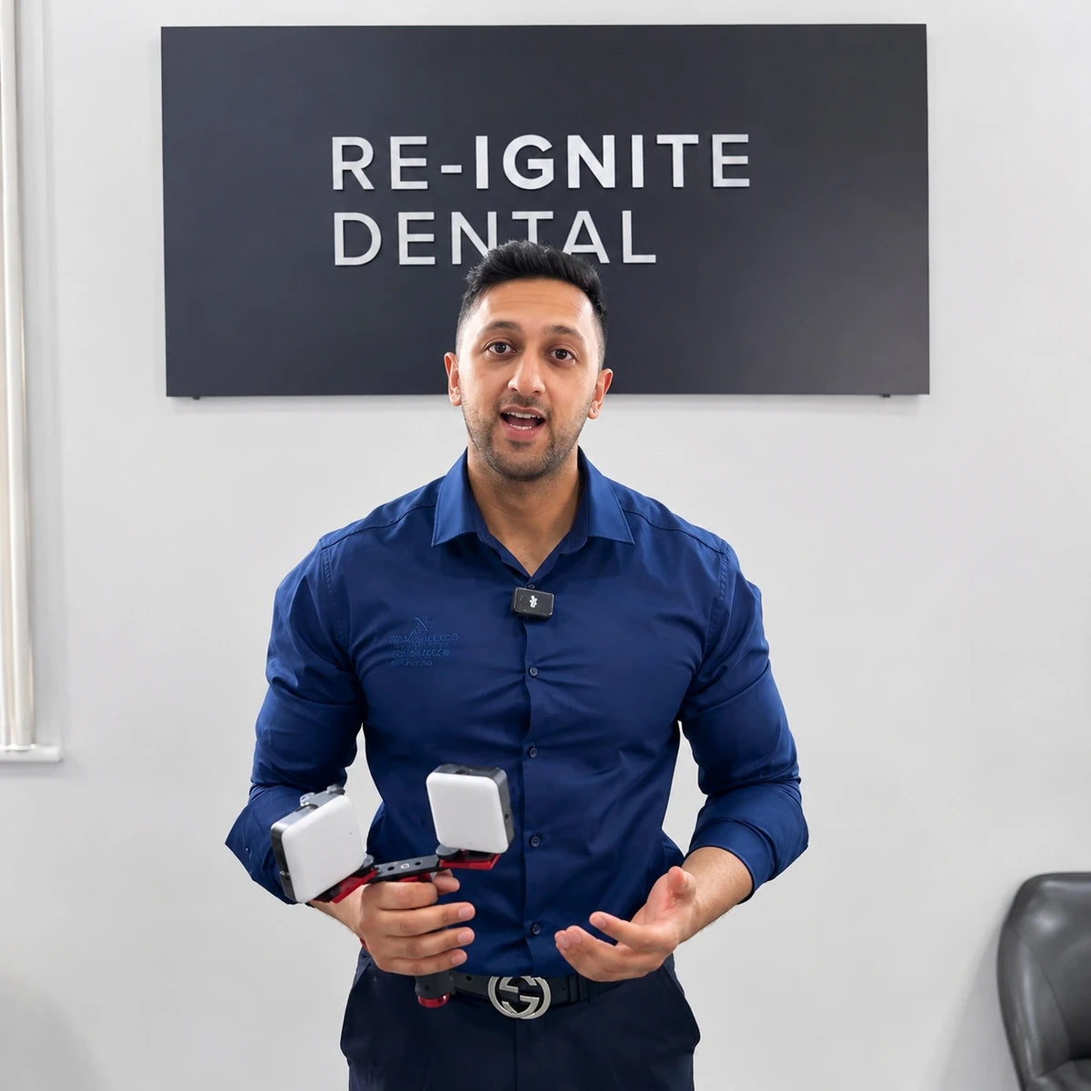 Dentist reviewing Twin Light dental photography kit