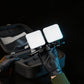 Dental twin light dual LED lights held out of carrying case.