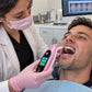 dentist using whitening shade analyzer on patient